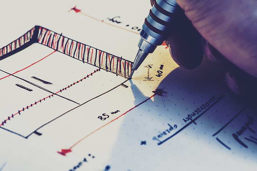 Hand drawing architectural blueprint with mechanical pencil