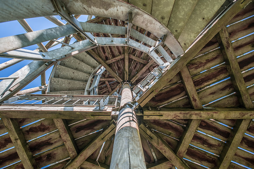 Low angle view of wooden spiral staircase structure