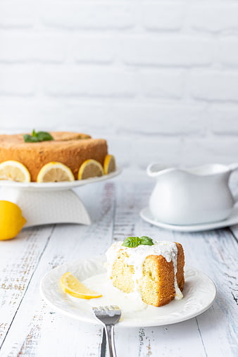 Lemon Basil Sponge Cake Slice on White Plate