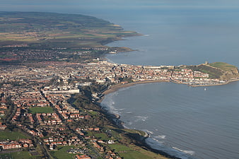 Aerial view of Scarborough coastline and harbor