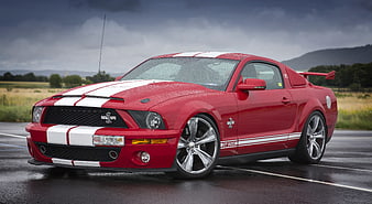 Red Ford Mustang Shelby GT500 Muscle Car On Wet Asphalt