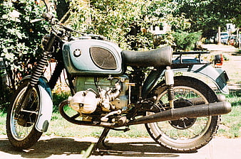 Vintage BMW Motorcycle Parked on Sunny Street