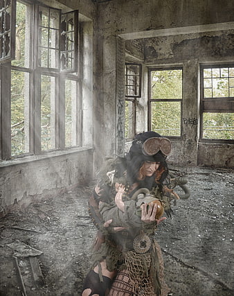 Steampunk woman holding doll in abandoned building