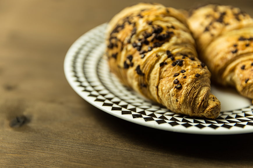 Chocolate Croissants on Patterned Plate