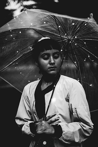 Woman with Lighted Umbrella in Black and White