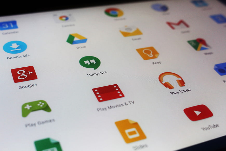 Close-up of Android tablet screen with Google apps icons