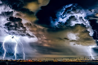 Dramatic Night Thunderstorm with Multiple Lightning Bolts