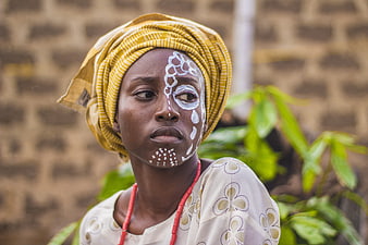 Portrait of African Woman with Traditional White Face Paint
