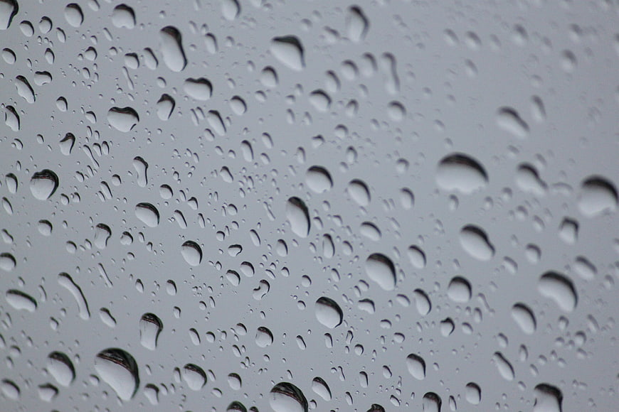Close-up of raindrops on a glass window pane
