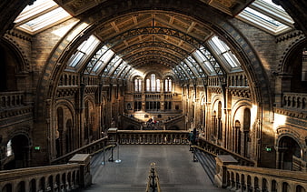 Grand Victorian Hall Interior with Arched Skylights and Staircase