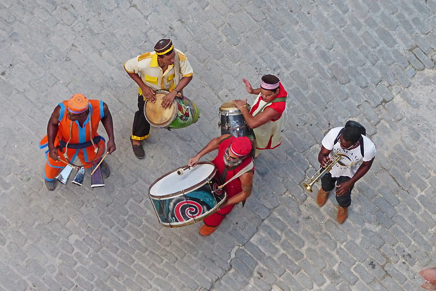 Aerial view of street musicians playing drums and trumpet
