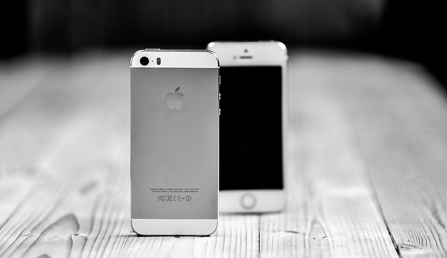 Silver iPhone 5s on Wooden Table