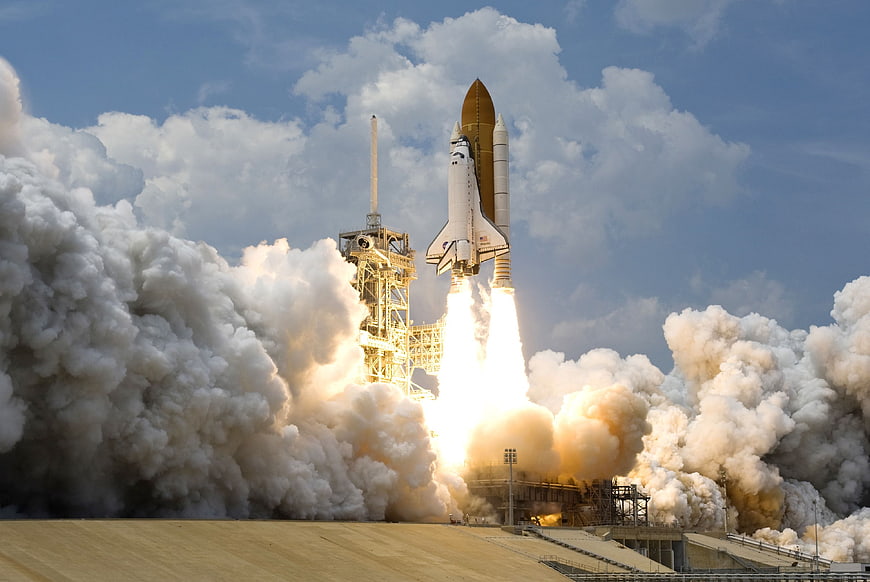 Space Shuttle Launching with Massive Smoke Plume