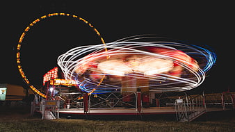 Long Exposure Carnival Ride Light Trails at Night