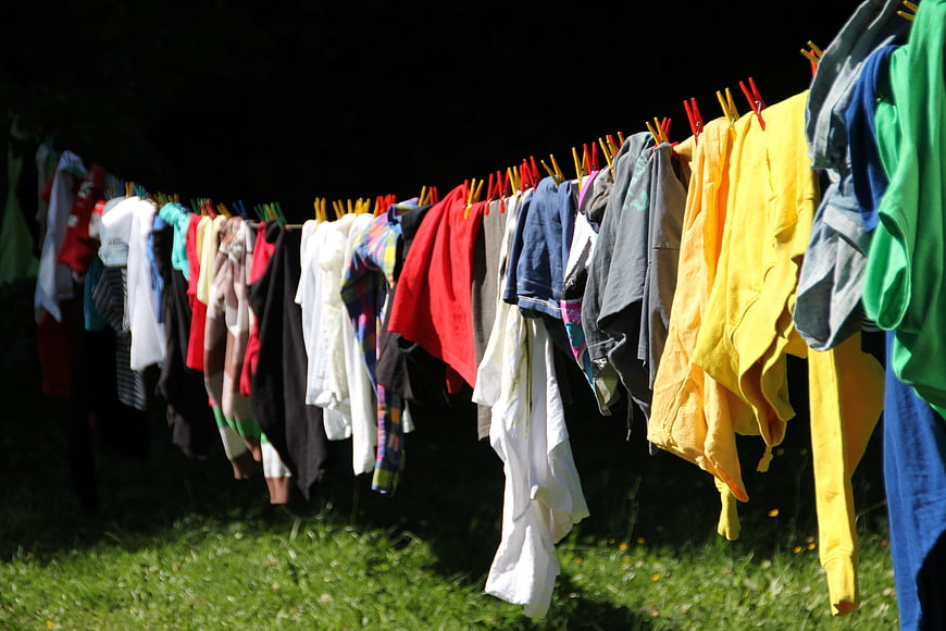 Colorful Laundry Hanging on Clothesline in Sunlight