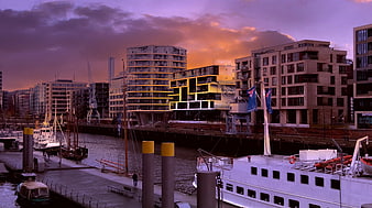 Modern City Marina at Sunset with Boats and Buildings