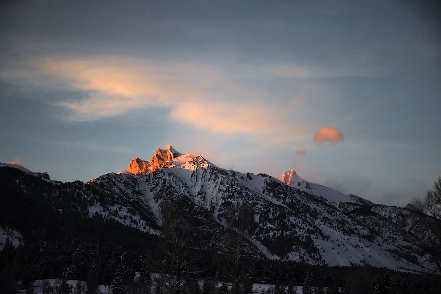 Snowy Mountain Peaks Bathed in Golden Alpenglow