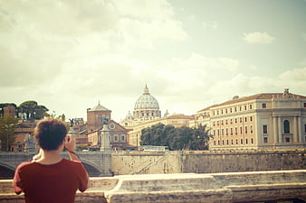 Tourist Photographing St. Peter's Basilica in Rome