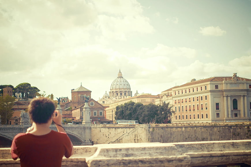 Tourist Photographing St. Peter's Basilica in Rome