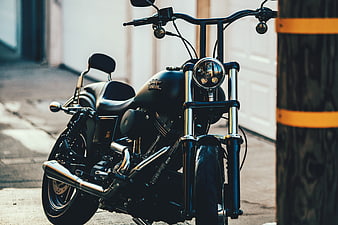 Black Harley-Davidson Motorcycle Parked on Street