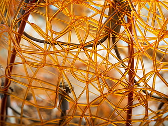 Abstract Close-Up of Amber Plastic Mesh Texture