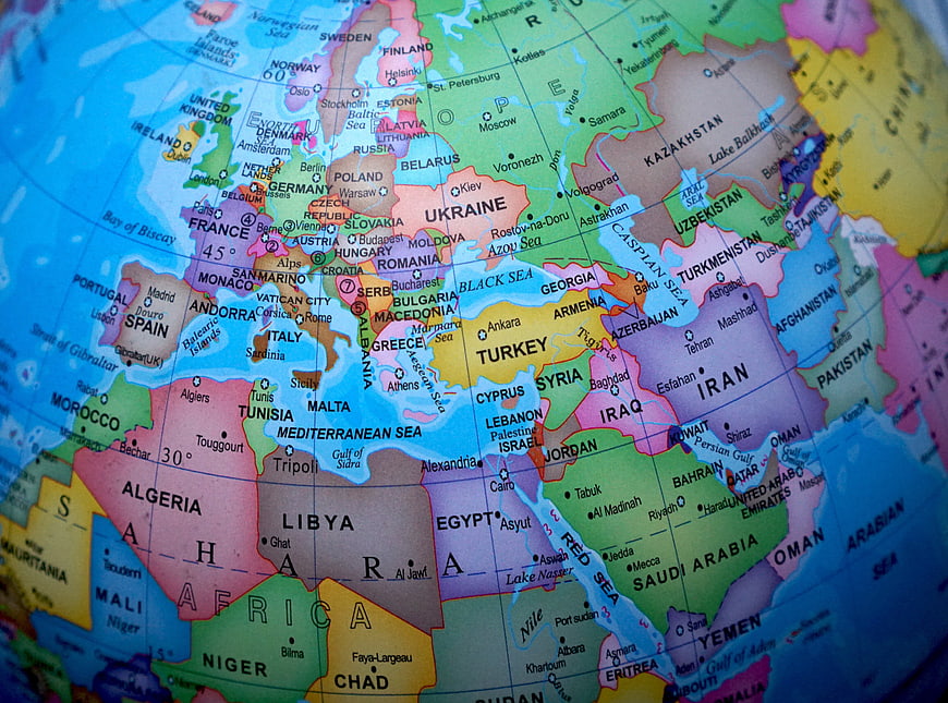Close-up of a colorful globe map showing Europe, Africa, and the Middle East