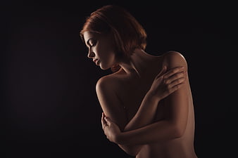 Sensual Fine Art Portrait of Woman in Dramatic Low-Key Lighting