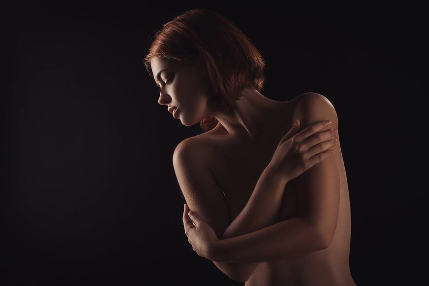 Sensual Fine Art Portrait of Woman in Dramatic Low-Key Lighting