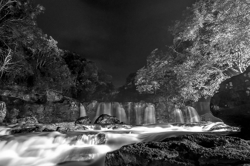 Black and white long exposure waterfall at night