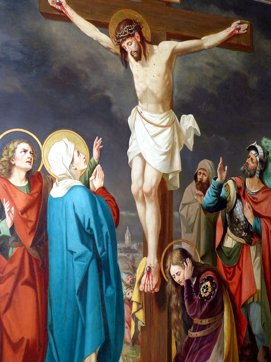 Classical painting of the crucifixion of Jesus with mourners