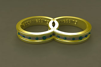 3D Rendered Gold Wedding Rings with Emerald Accents
