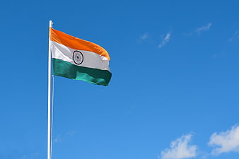 Indian National Flag Flying Against Clear Blue Sky