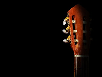 Acoustic Guitar Headstock Detail On Black Background