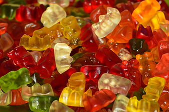 Close-up of colorful gummy bears candy pile
