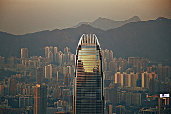 Modern Skyscraper in Hong Kong Cityscape at Dusk