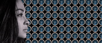 Woman Profile Against Pattern of Blue Clocks