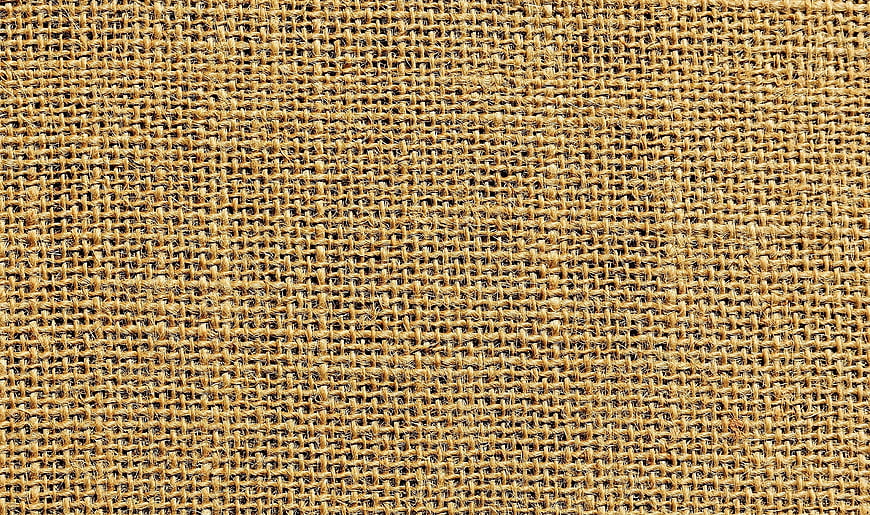 Close-up texture of woven jute fabric background
