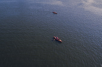 Aerial View of Two Kayaks on Calm Blue Water