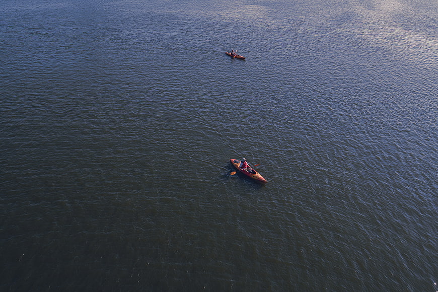 Aerial View of Two Kayaks on Calm Blue Water