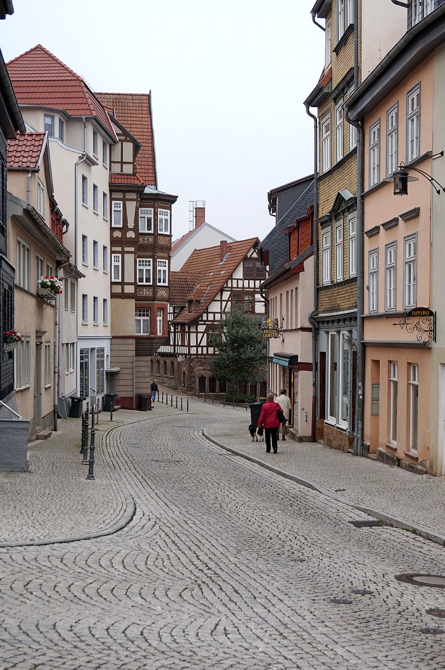 Cobblestone street in historic German town with half-timbered houses