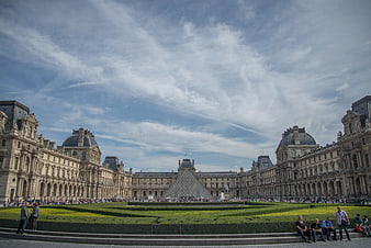 Wide Angle View of Louvre Museum Pyramid and Courtyard in Paris