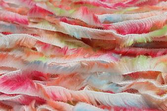 Close-up of colorful pastel yarn strips texture