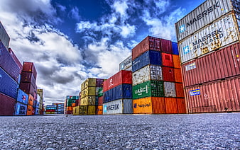 Colorful Stacked Shipping Containers at Port Terminal