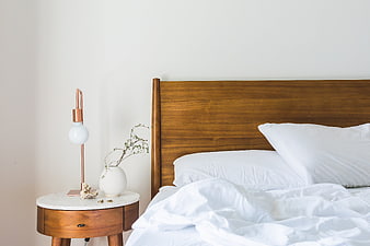 Minimalist Bedroom Interior with Wooden Bed and Nightstand
