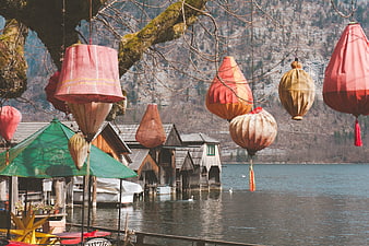 Colorful Lanterns Hanging Over Lake Hallstatt Wooden Boathouses