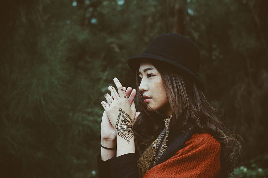 Asian Woman with Henna Tattoo in Forest