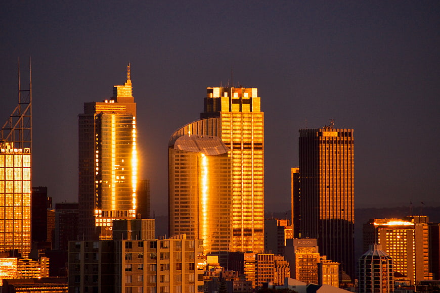 Golden Hour City Skyline with Glowing Skyscrapers