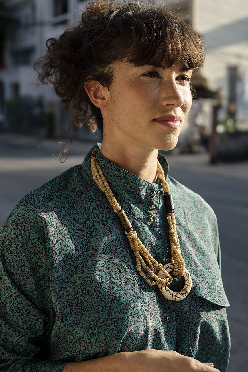 Portrait of Woman with Necklace in Sunlight
