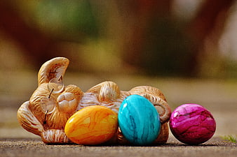 Wooden Easter Bunny Figurine with Colorful Eggs