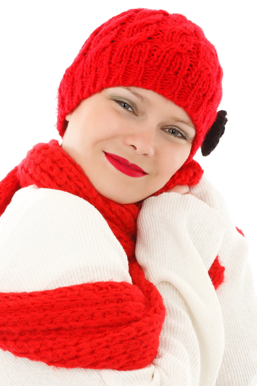 Woman in Red Knitted Hat and Scarf Smiling